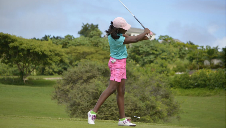 woman slicing off the tee