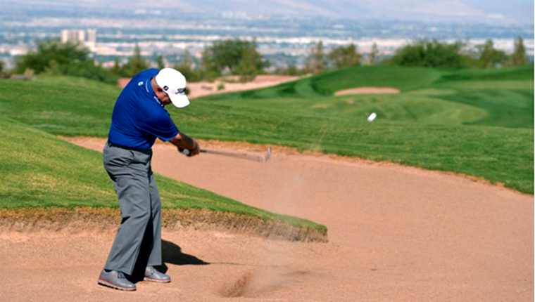 butch harmon playing from the sand